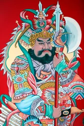Templo budista chino Hoi Tuong Te Nguoi Hoa. Pinturas de figuras guardianas en la puerta. Phu Quoc, Vietnam